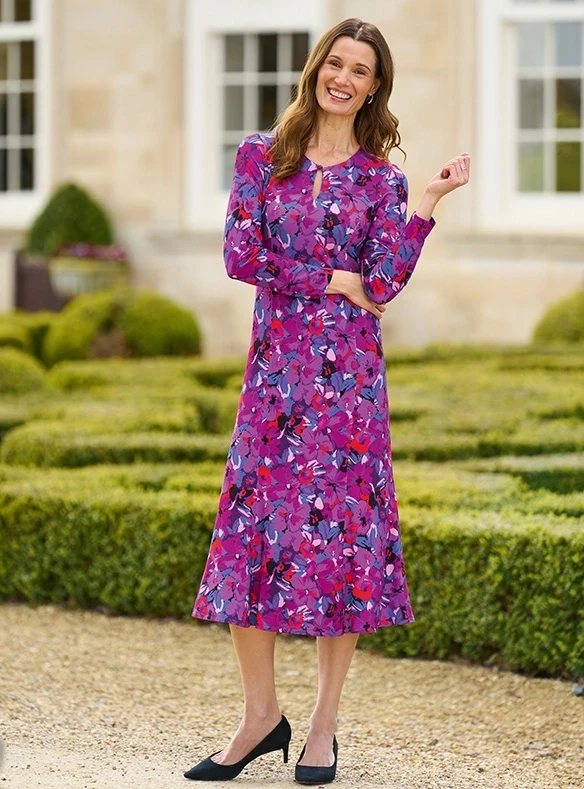 Robe luxueuse fleurie à ouverture goutte