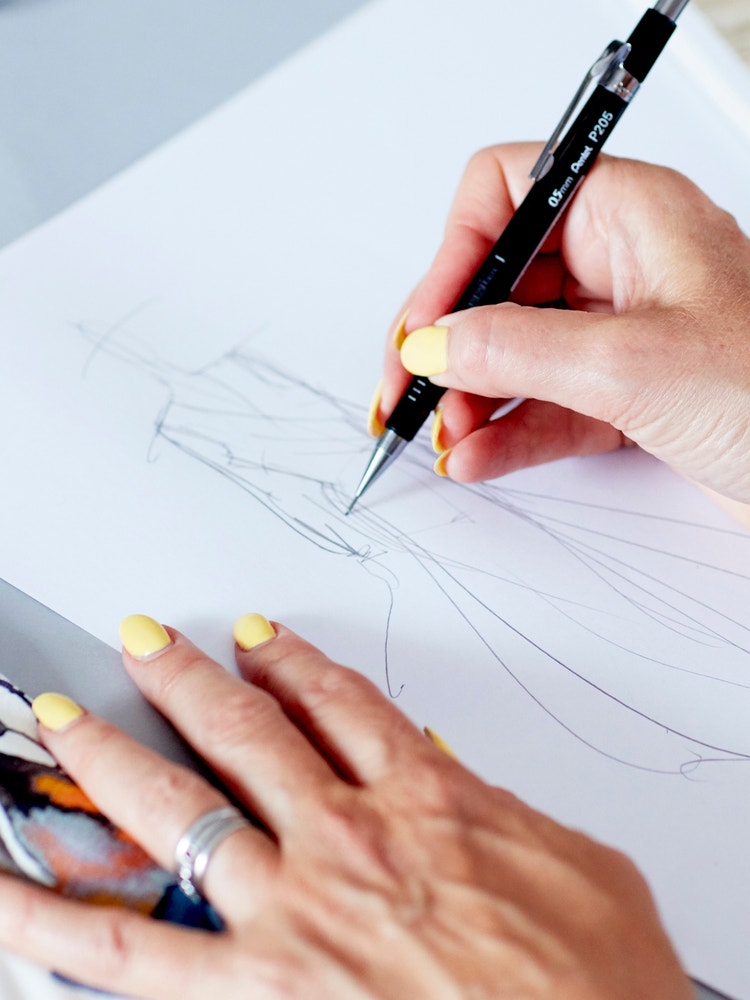 Designer sketching a new David Nieper design