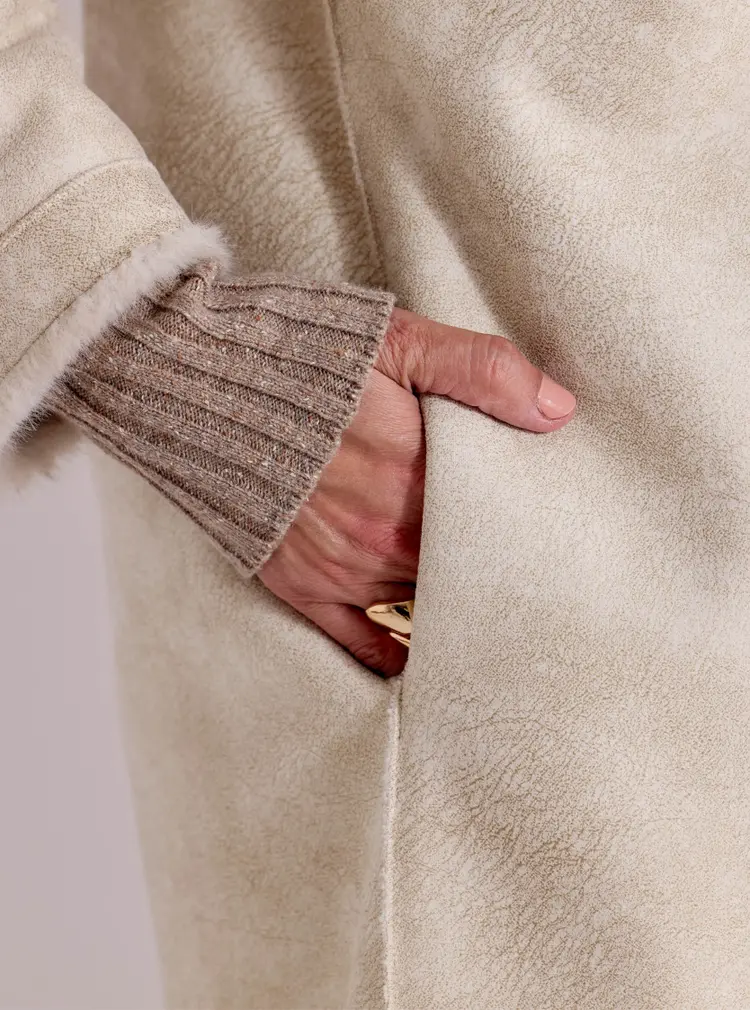 Manteau réversible en fausse fourrure